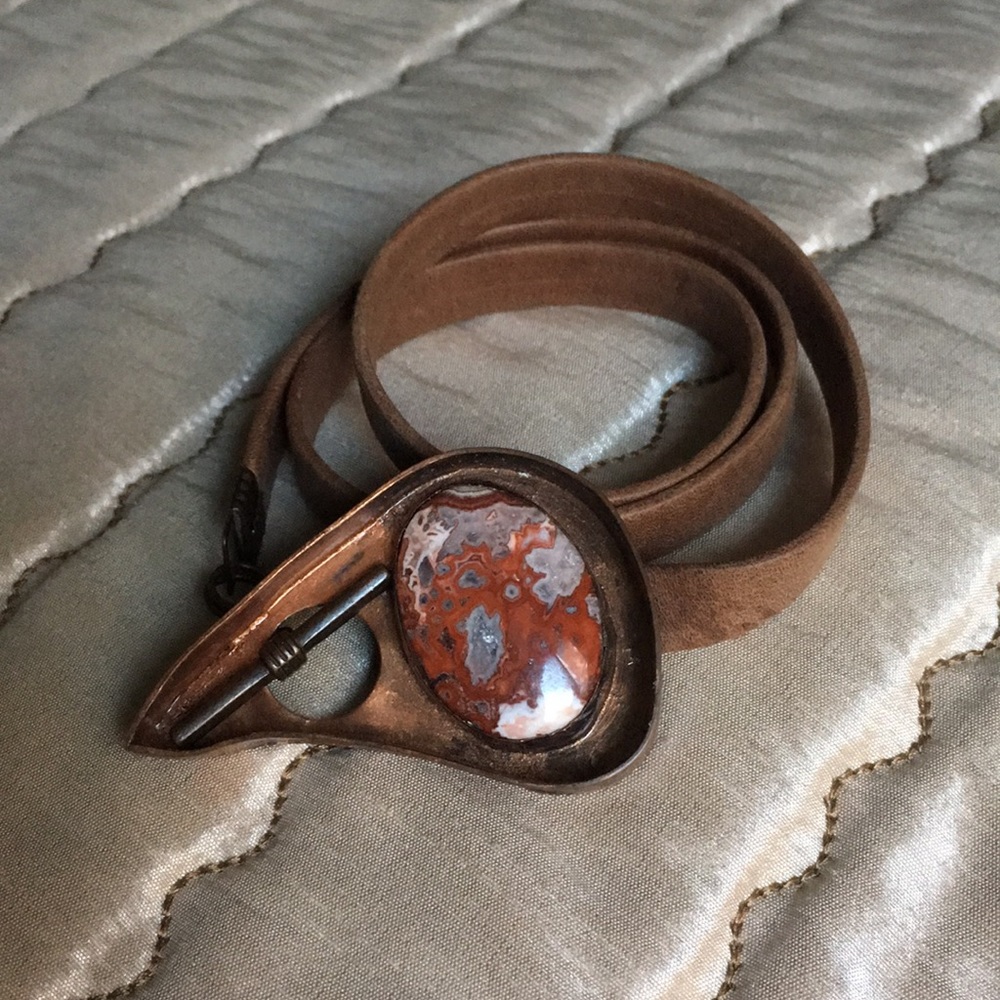 Leather, copper and stone wrist wrap. Like new. Artsy and unique.